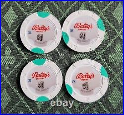 100 Paulson RHC Ballys, Quad Cities $1's Bright White with dayglo green edge spots